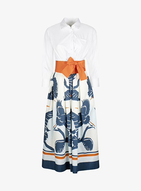 jurk lang wit blouse en wijde dessin rok