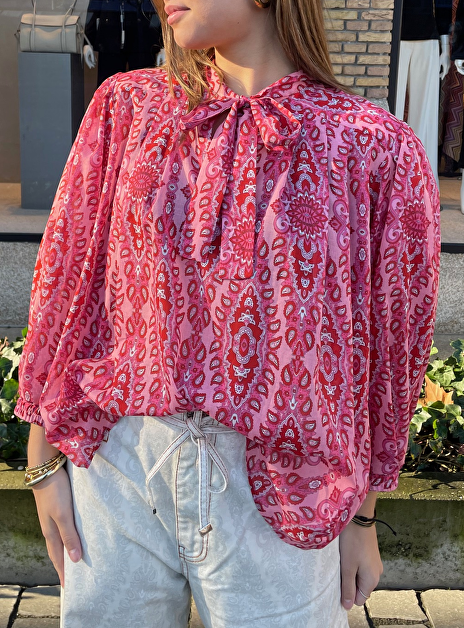 Blouse roze rood dessin