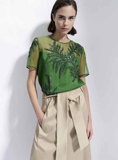 Top groen dessin en pailetten