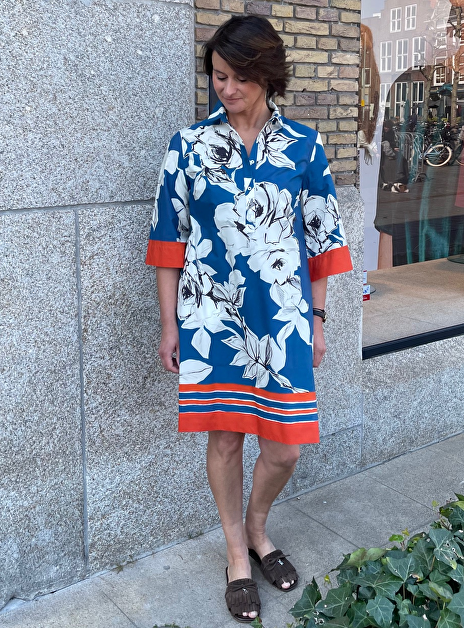 Tuniekjurk blauw bloemen met oranje bies